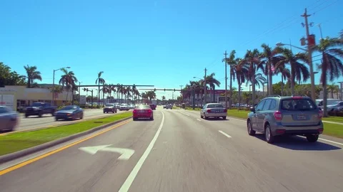 Driving on South Federal Highway Florida business district car dealerships 4k Stock Footage