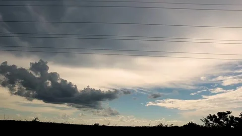 Driving by storm clouds Stock Footage 92377383