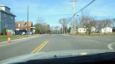 Driving on a suburban road Stock Footage 26371346