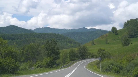 Driving on a summer mountain road Video stock 93202749