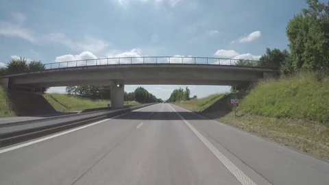 Driving on the sunny highway Video stock 83499869