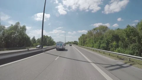Driving sunny road Stock Footage 83499827