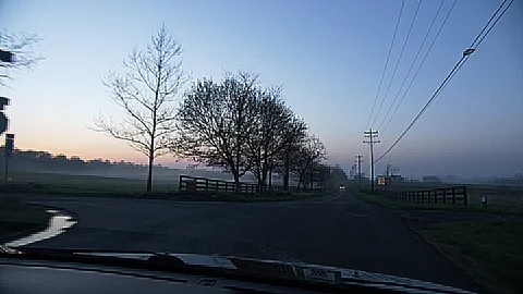 Driving at sunrise - slow motion Stock Footage 89433532