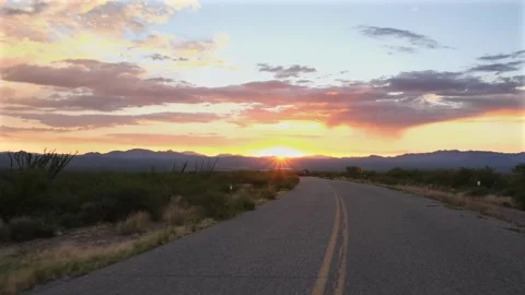 Driving into the sunset POV Stock Footage 136309108