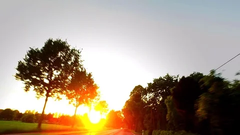 Driving at Sunset - POV - Time Lapse - 3 Stock Footage 76004764