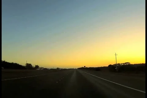 Driving at sunset V2 - NTSC Stock Footage 12440499