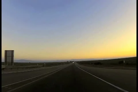 Driving at sunset V4 - NTSC Stock Footage 12440494