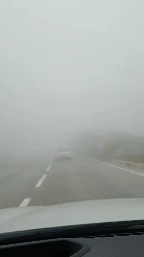 Driving in thick fog. Stock Footage 329227584