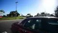 Driving Three Quater Rear 05 Street by a park HD Footage