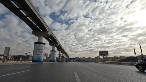 Driving Through Active City Residential District New Cairo Showing Buildings Stock Footage 329698034