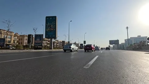 Driving Through Active Streets New Cairo Showing Modern Buildings Traffic And Stock Footage 329800460
