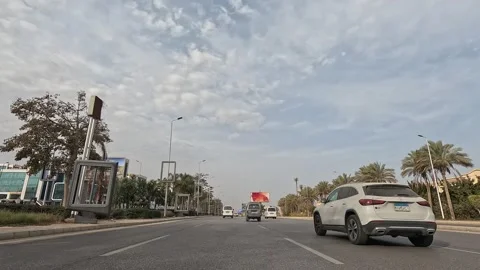 Driving Through Active Urban District Roads New Cairo Showing Buildings Traffic Stock-Footage 329754661