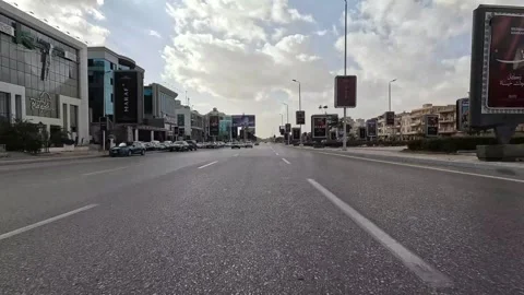 Driving Through Active Urban Residential Streets New Cairo Showing Buildings Stock Footage 329659740