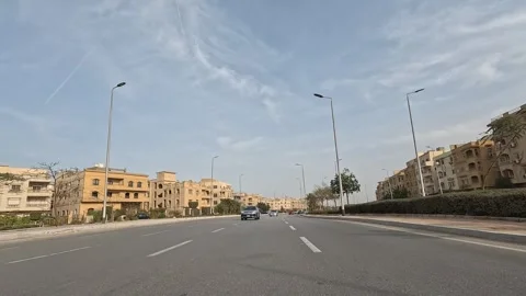 Driving Through Active Urban Residential Streets New Cairo Showing Buildings Vídeo Stock 329765161