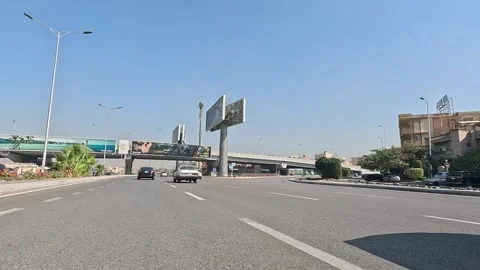 Driving Through Active Urban Residential Streets New Cairo Showing Buildings Stock Footage 329813067