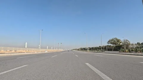 Driving Through Active Urban Residential Streets New Cairo Showing Buildings Stock Footage 329814953