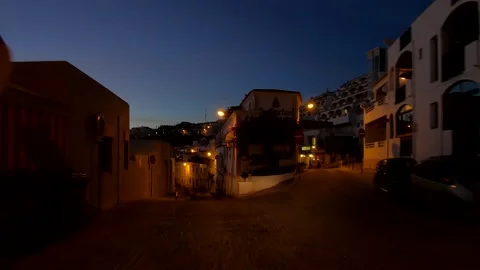 Driving through Albufeira at twilight After Covid 19 Lockdown, Algarve, Portugal Stock Footage 144713389
