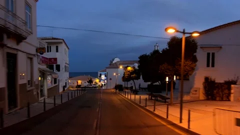 Driving through Albufeira at twilight After Covid 19 Lockdown, Algarve, Portugal Stock Footage 145875559