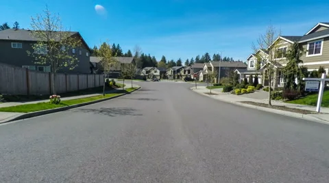 Driving through an American suburban neighborhood Stock Footage