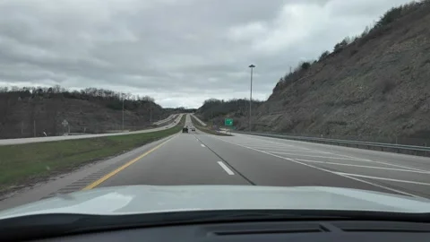 Driving Through Appalachian Mountains in Spring Under Cloudy Sky Stock-Footage 332382565