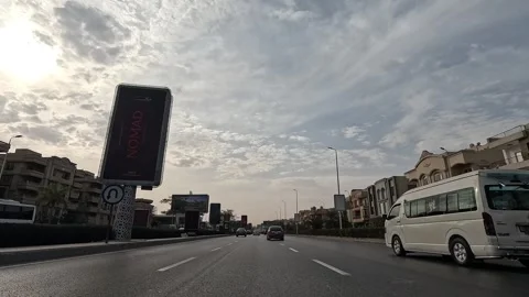 Driving Through Bright Boulevards New Cairo Showing Buildings Traffic Vehicles Stock Footage 329756730
