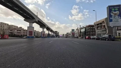 Driving Through Bright City District Streets New Cairo Showing Buildings Traffic Stock Footage 329656271