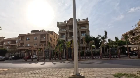 Driving Through Bright Urban Residential Streets New Cairo Showing Buildings Stock Footage 329780997