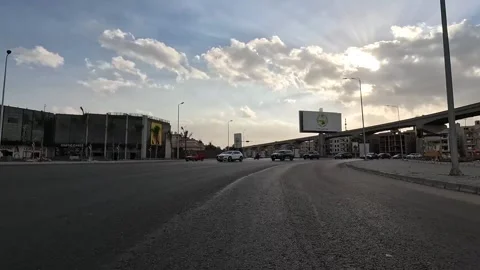 Driving Through Broad City District Roads New Cairo Showing Buildings Traffic Stock Footage 329660271