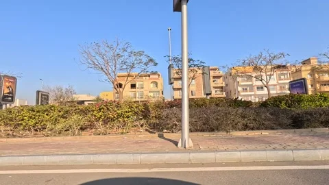 Driving Through The Busy Roads Of New Cairo Showing Buildings Traffic Vehicles Stock Footage 329817106