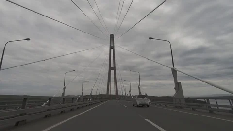 Driving through the cable-stayed bridge. Beauty. F-log. Stock Footage 90211365