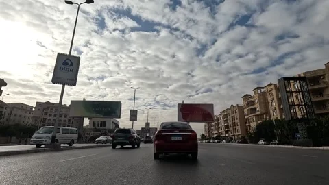 Driving Through Calm Streets New Cairo Showing Modern Buildings Traffic And City Stock Footage 329695170