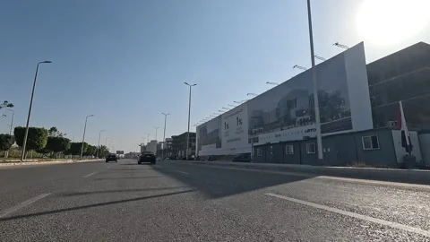 Driving Through Calm Urban District Streets New Cairo Showing Buildings Traffic Stock-Footage 329809872