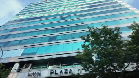 Driving through the city while looking at the urban scenery Stock Footage 289452239