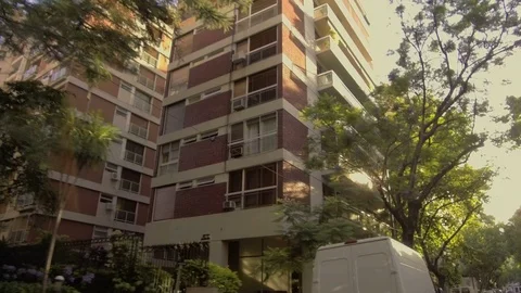 Driving through the city, window POV - cars, buildings, traffic. Stock Footage 84329448