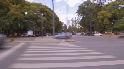 Driving through the city, window side POV - cars, buildings, traffic, park. Stock Footage 121120767
