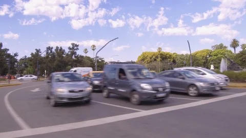 Driving through the city, window side POV - cars, buildings, traffic, park. Stock Footage 121145626