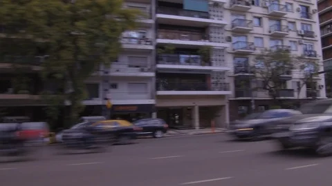 Driving through the city, window side POV - cars, buildings, traffic Stock Footage 121162831