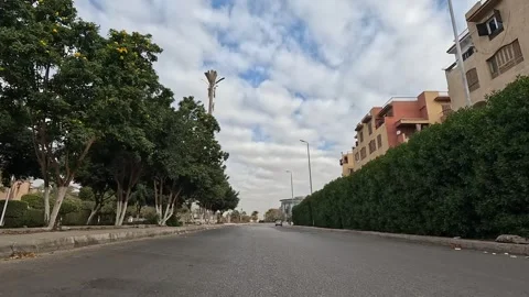Driving Through Clean Streets New Cairo Showing Buildings Traffic Vehicles Stock Footage 329693184