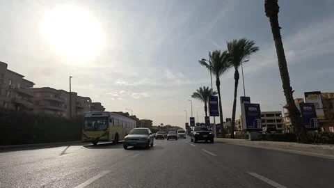 Driving Through Clean Streets New Cairo Showing Buildings Traffic Vehicles Stock-Footage 329766401