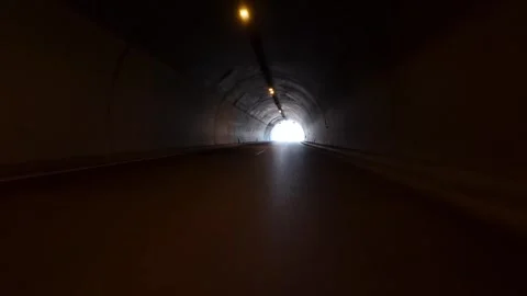 Driving Through a Dark Modern Highway Tunnel with Lights, POV Video Vídeo Stock 338182522