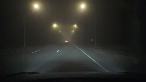 Driving Through Dense Fog at Night - POV Dashboard Camera Footage Stock Footage 334936125