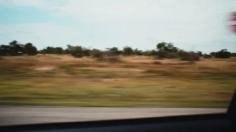 Driving Through the Desert Brush Along a West Texas Highway – 4K Video stock 320848801