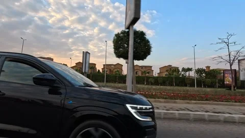 Driving Through Developed City Streets New Cairo Showing Buildings Traffic 動画素材 329891376