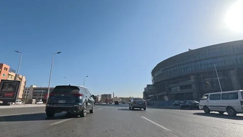 Driving Through Developed Streets New Cairo Showing Modern Buildings Traffic And Stock Footage 329670491