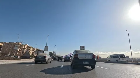 Driving Through Developed Urban District Roads New Cairo Showing Buildings Stock Footage 329670961