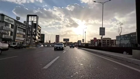 Driving Through Developed Urban Streets New Cairo Showing Buildings Traffic Video stock 329660933