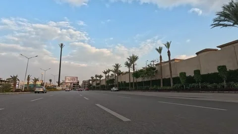 Driving Through District Roads New Cairo Showing Buildings Traffic Vehicles And Stock Footage 329897932
