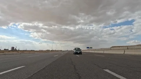 Driving Through Eastern Desert Corridor Linking Cairo Ain Sokhna Showing Traffic Video stock 330040050
