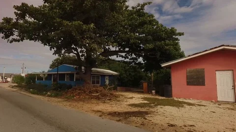 Driving Through Eight Mile Rock Community, Grand Bahama, Bahamas Stock Footage 99913352