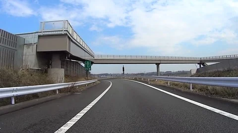 Driving through Electric Tool Collection (ETC) gate of Ken'ou Expressway Video stock 75681935